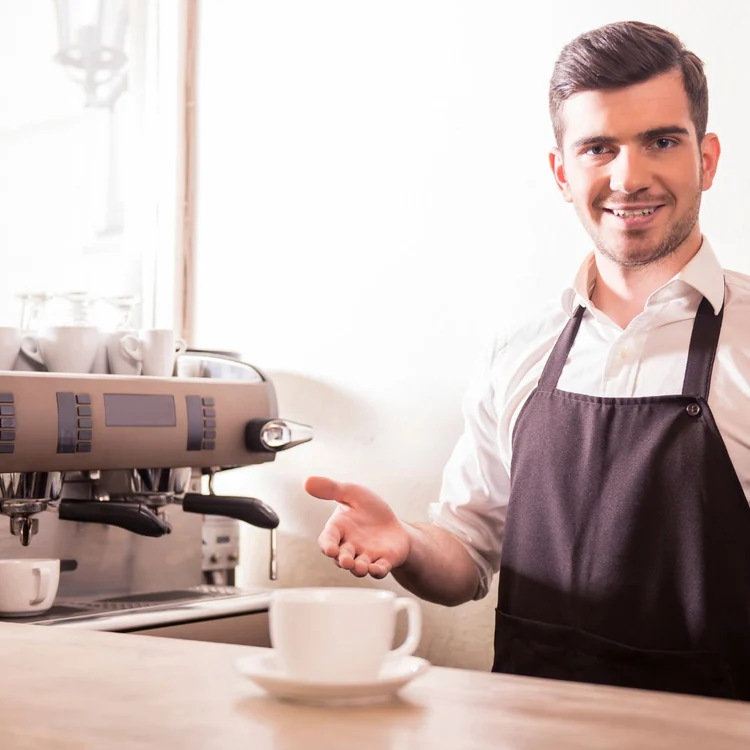 A barista preparing espresso coffee at the Geelong training classroom